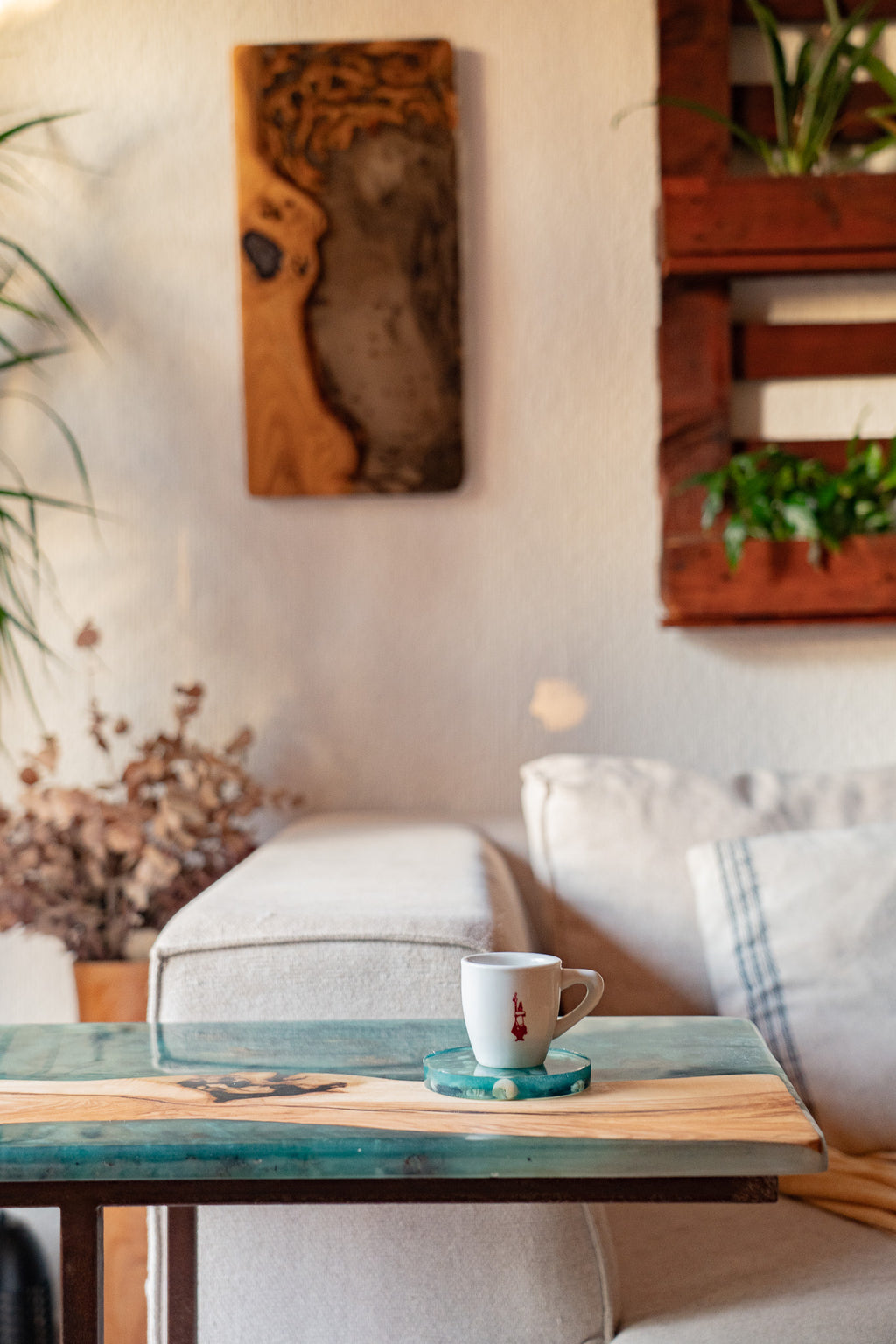 Ibiza line side table with a cup on top to visualize how the table looks with something horizontal on it
