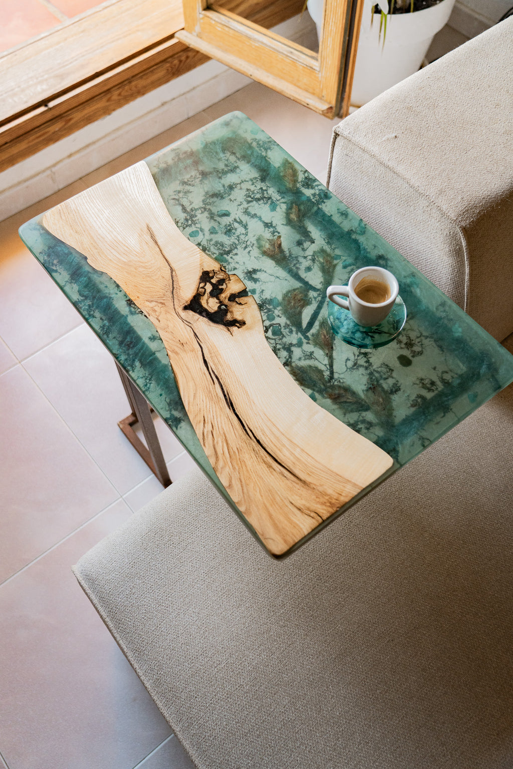 Ibiza line side table with a cup on it to visualize how the table looks with something on it
